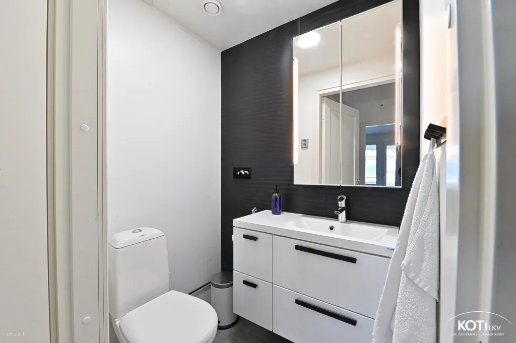 Bathrooms - Renovated Apartment with Balcony in Soukka