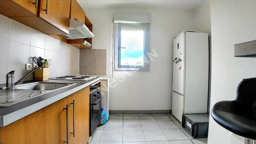 Cuisine - Appartement T3 avec Balcon et Piscine dans Résidence Sécurisée