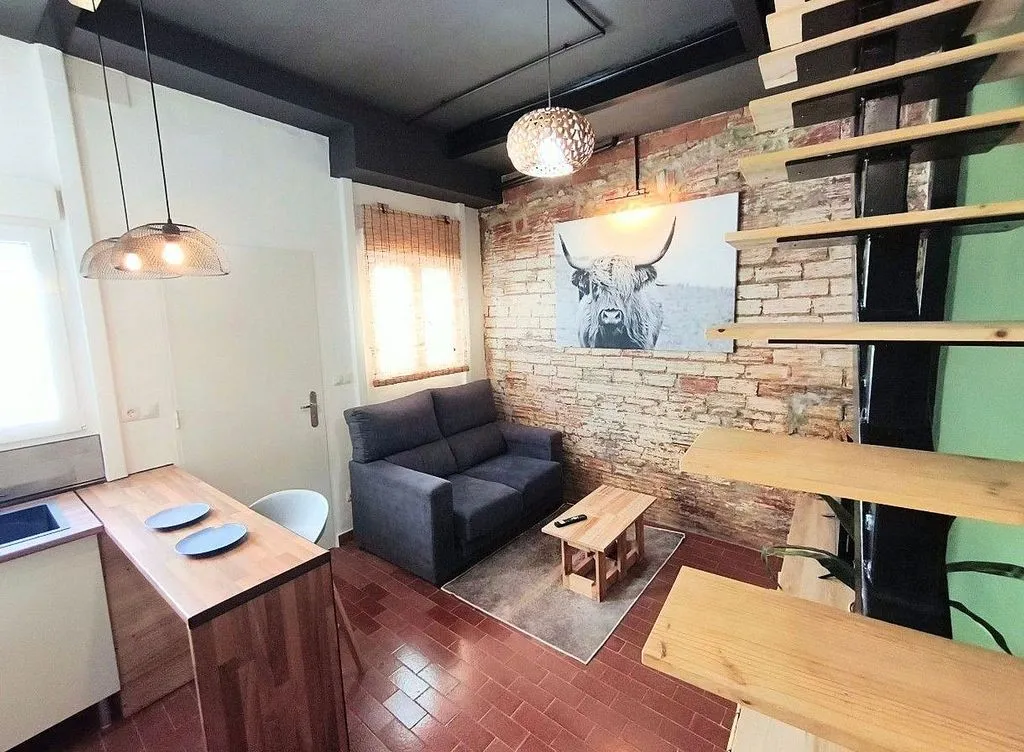 Séjour - Studio Duplex with Terrace in Sant Joan Bosco
