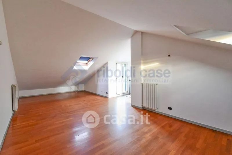 Toad - Four-Room Apartment with Balconies in Mariano Comense