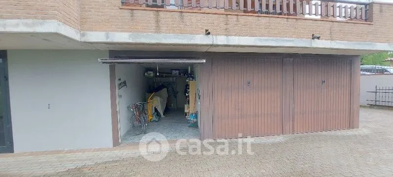 Garage - Two-Storey Apartment with Balcony in Serramazzoni
