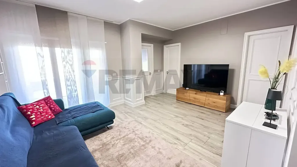 Living Room - Modern Apartment with Balcony in Cosenza