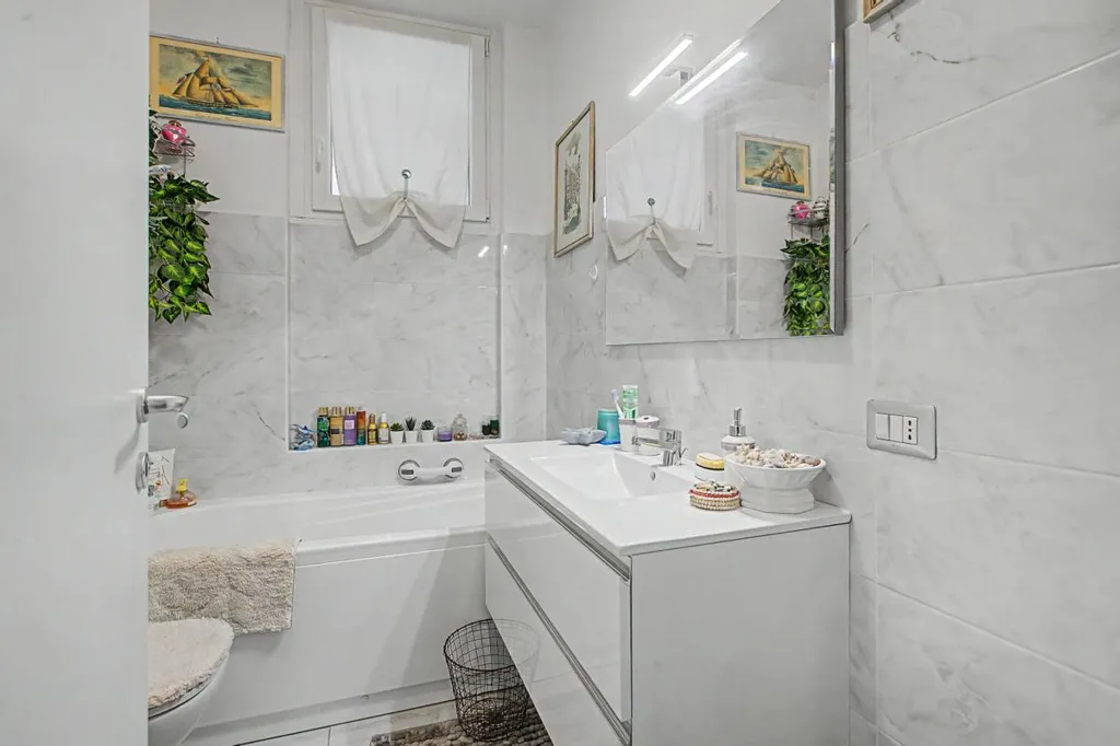 Bathrooms - Rear-Accessed Apartment with Parking in Milan