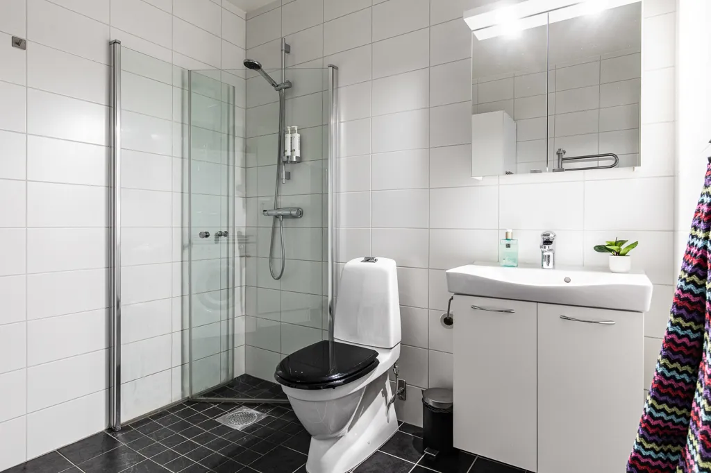 Bathrooms - Corner 4th Floor Flat with Balcony in Odensala