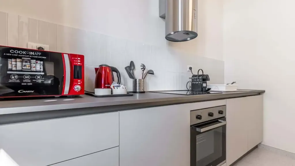 Kitchen - Fully Furnished Studio in Milan