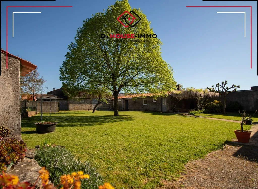 Jardin - Maison avec Jardin et Garage à Nalliers