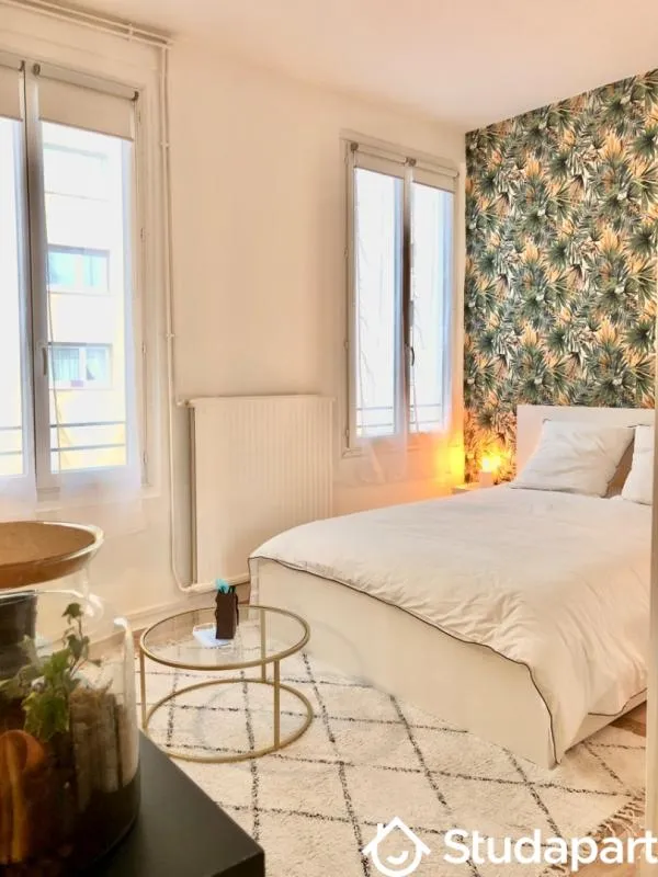 Chambres - Appartement Lumineux avec Coin Bibliothèque à Paris