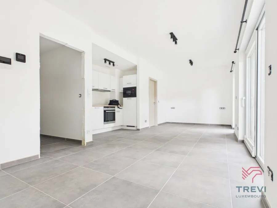 Séjour - Studio Neuf avec Jardin à Arlon