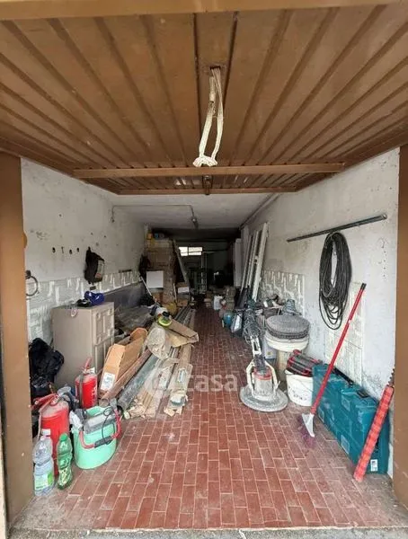 Garage - Three-Bedroom Apartment with Garden in Vercelli