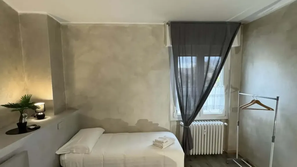 Bedrooms - 1-Bedroom Apartment with Private Parking in Basiglio