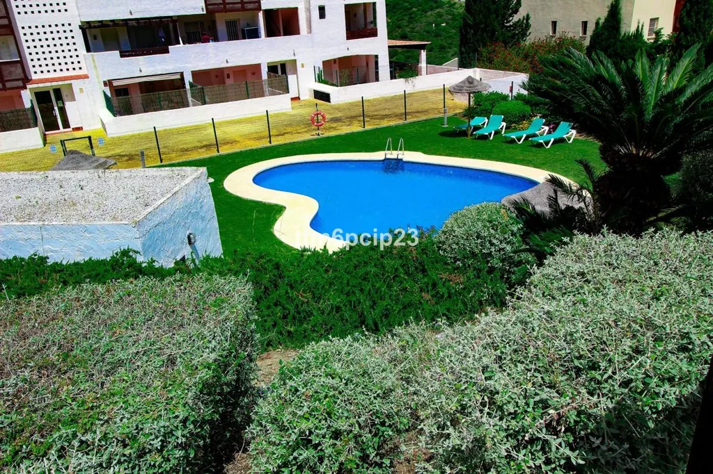 Piscine - Ground Floor Apartment with Golf Views in Manilva