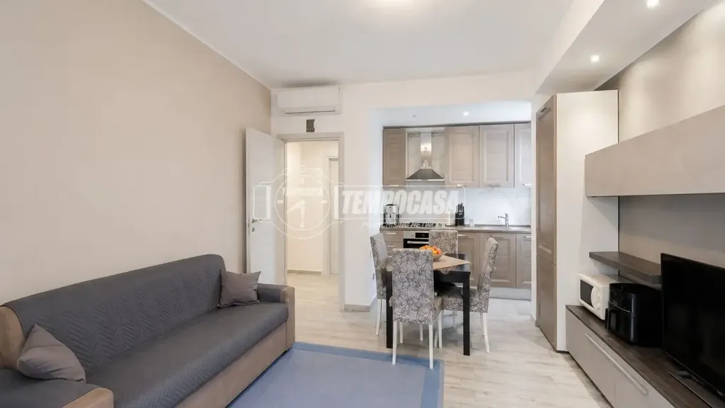 Séjour - Modernised Three-Bedroom Apartment in Muggiò