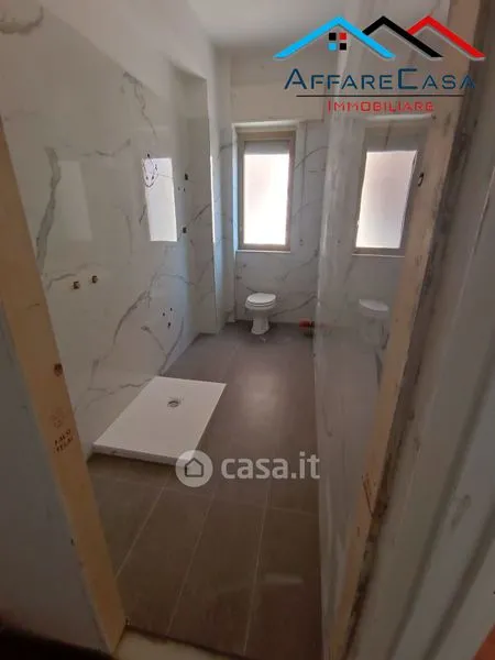 Salles de bain - Three-Bedroom Apartment with Balcony in Caltanissetta