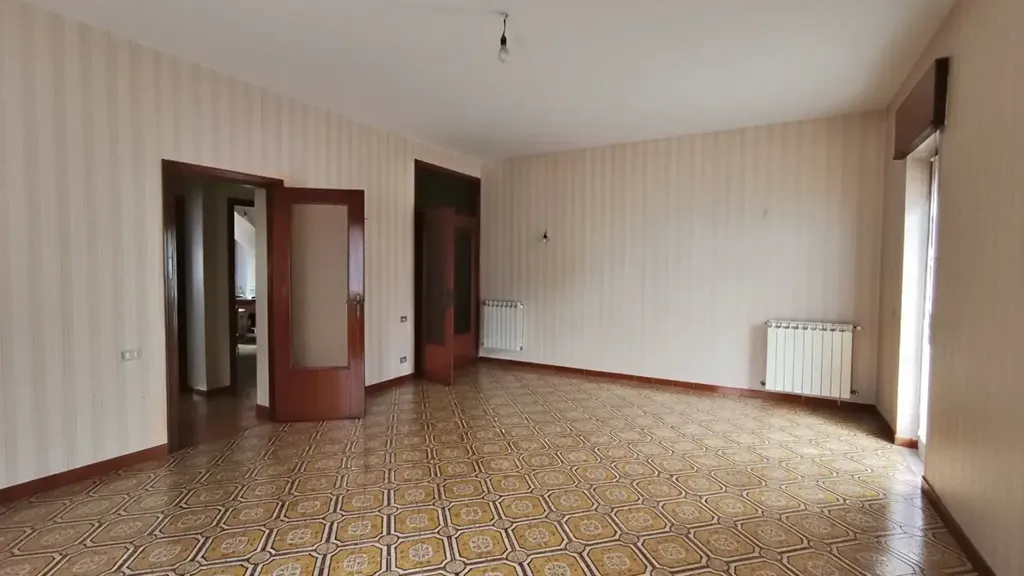 Séjour - Three-Bedroom Apartment with Balcony in Solofra
