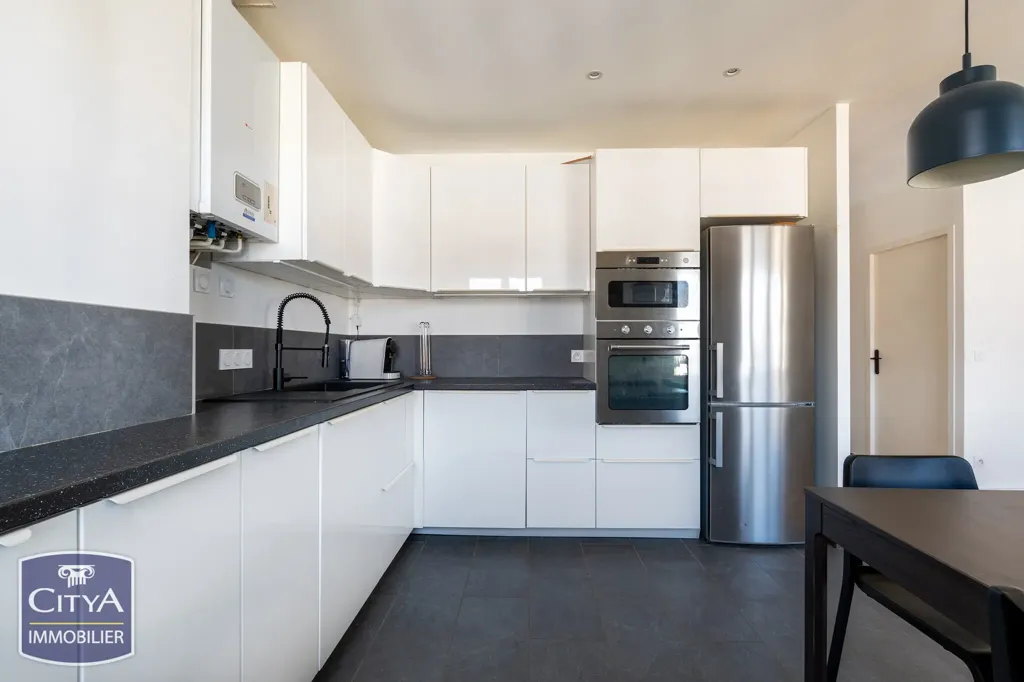 Cuisine - Appartement 3 Chambres avec Séjour Lumineux à Lyon 7e