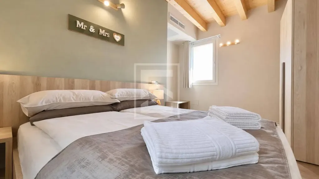 Bedrooms - Restored Triplex with Garden View in Manerba del Garda