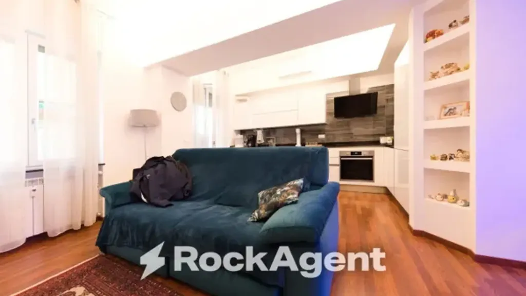 Living Room - Penthouse Apartment with Balcony in Genoa