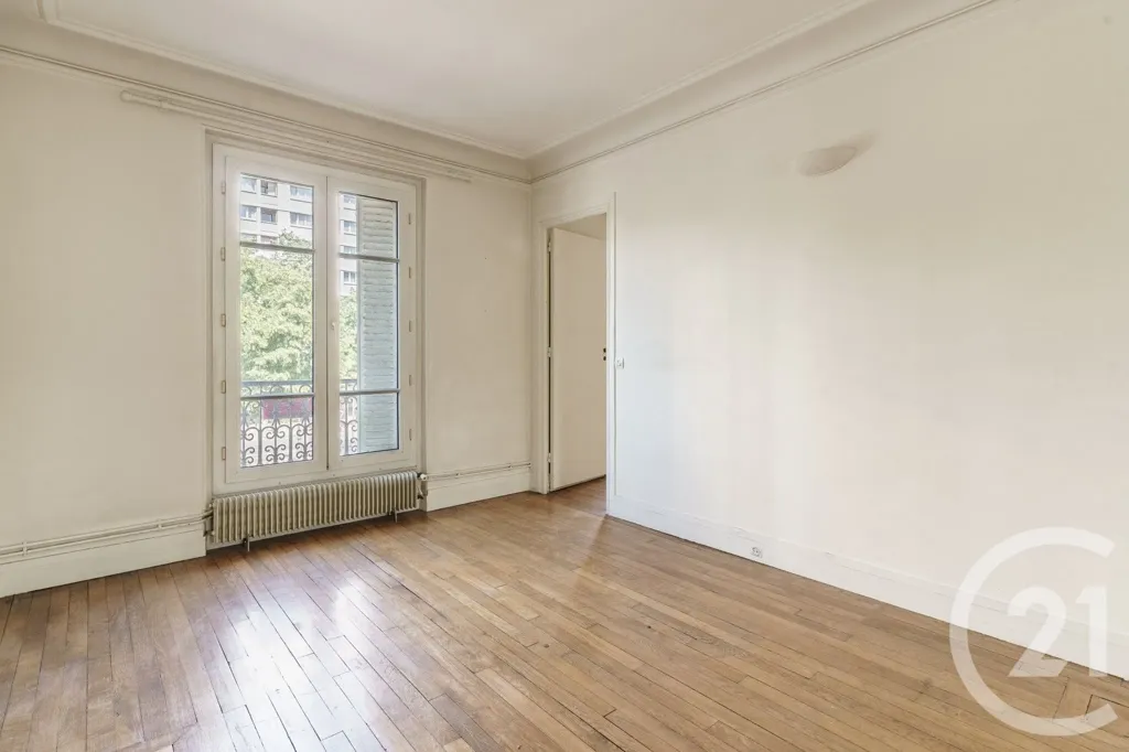 Pièces - Appartement Familial avec Moulures à Paris 19ème