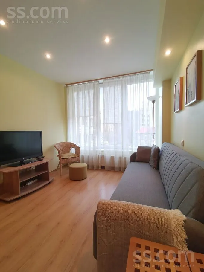 Living Room - Bright Apartment with Secure Parking in Riga Centre