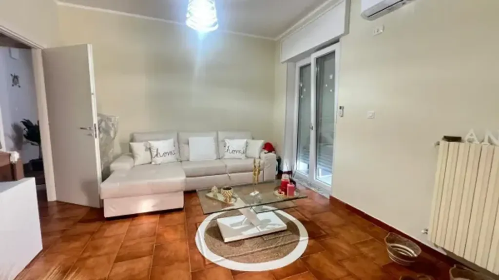 Séjour - Three-Bedroom Apartment with Balcony in Giugliano
