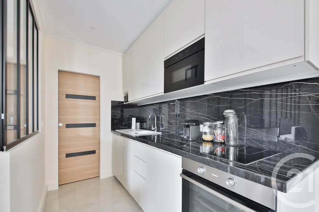 Cuisine - Appartement F2 au Calme avec Vue Dégagée à Paris 16e