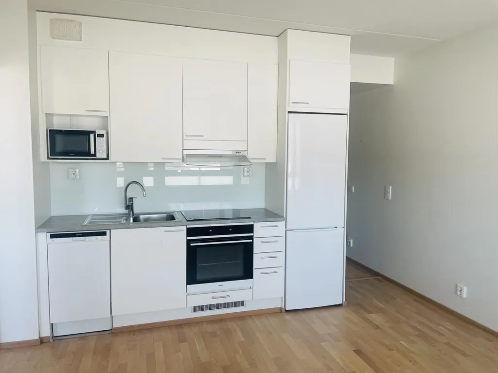 Kitchen - Bright Apartment with Balcony in Nummela