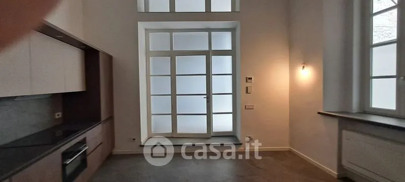 Kitchen - Elegant Trilocale with Private Patio in Como