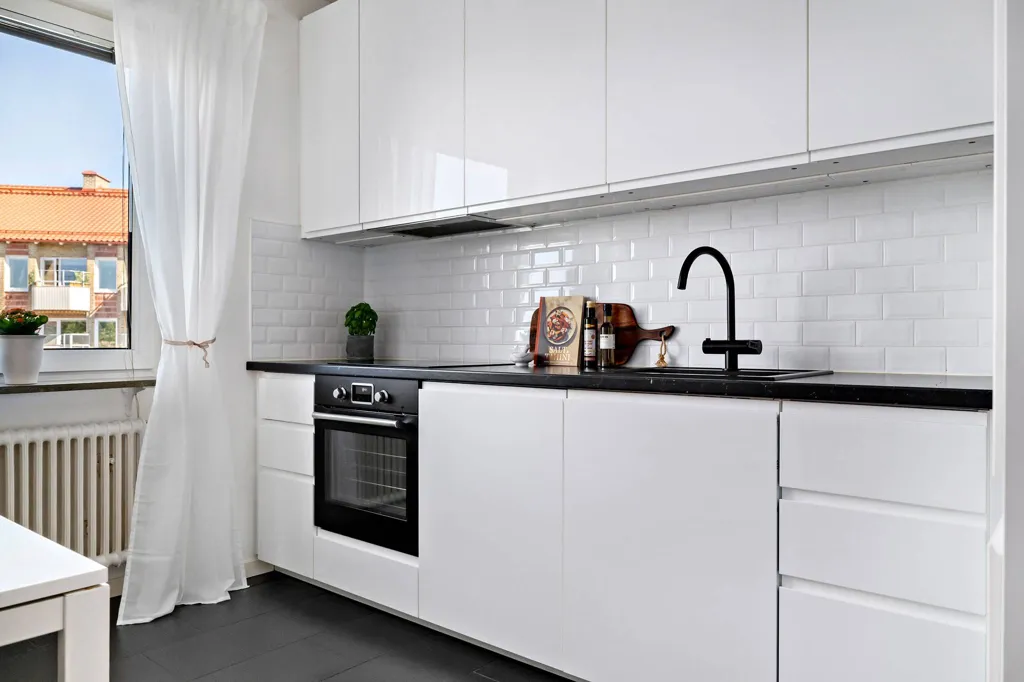 Kitchen - Modern Two-Bedroom with South-Facing Balcony in Malmö