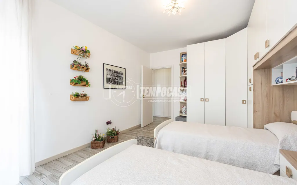 Camere da letto - Appartamento con terrazzi e vista panoramica a Costa Masnaga