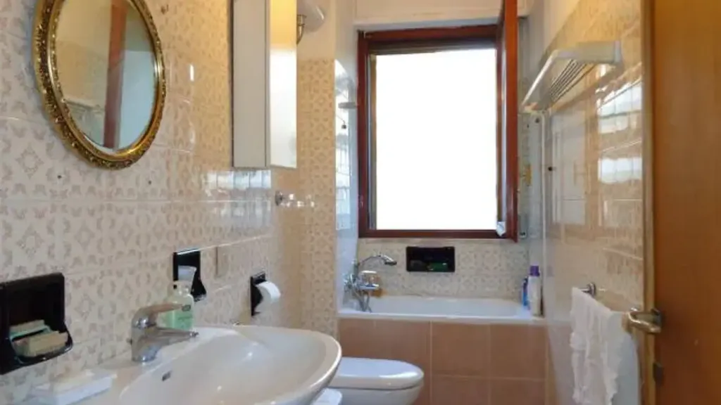 Salles de bain - Apartment with Garden Views in Pisa Centre