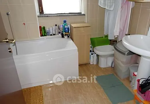 Bathrooms - Three-bedroom Apartment with Parking in Roncello