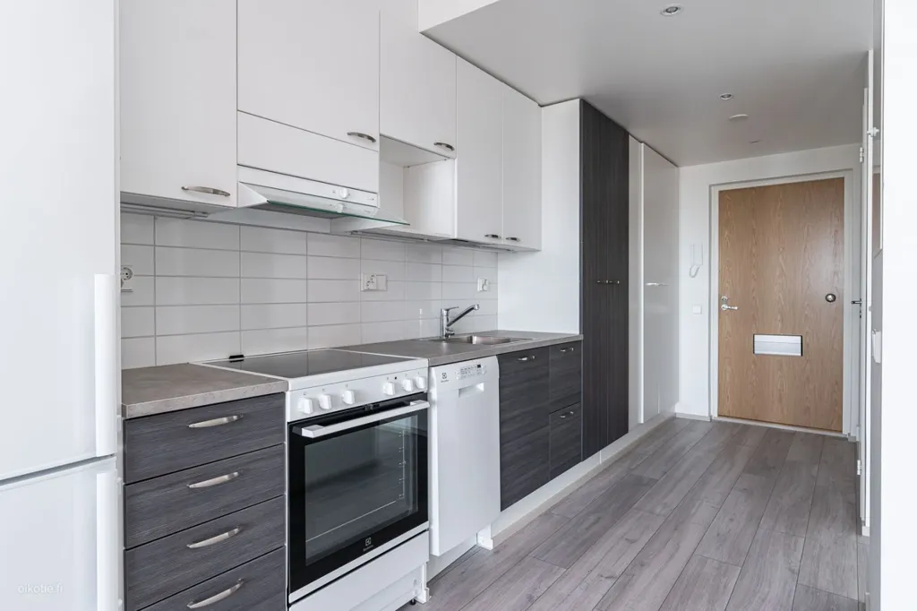 Kitchen - Modern Flat with Balcony in Keimola, Vantaa