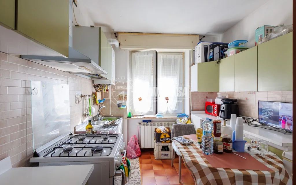 Kitchen - Partially Refined Apartment with Balcony in Parma