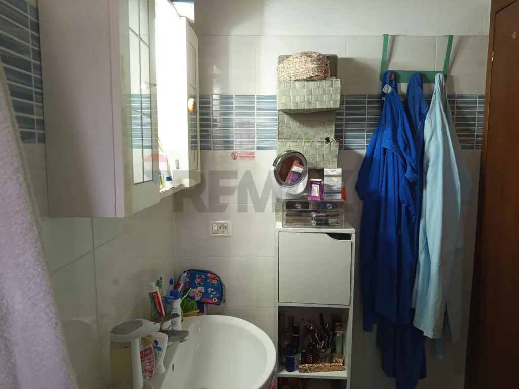 Bathrooms - Bright Apartment with Terrace in Central Piombino