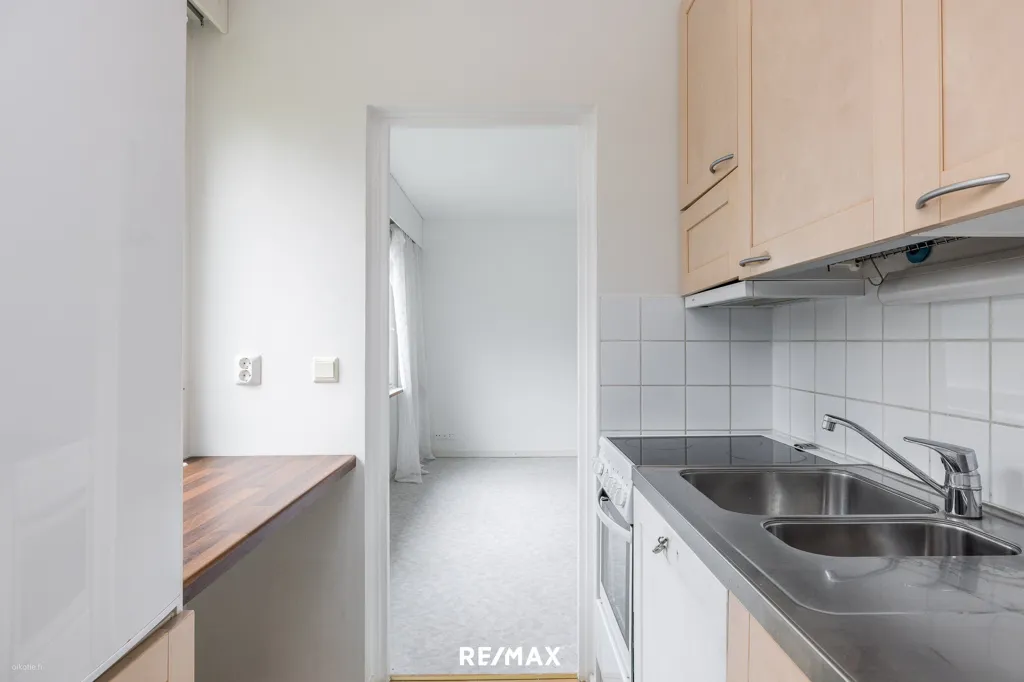 Cuisine - Bright Two-Bedroom Flat with Garden View in Kirkkonummi