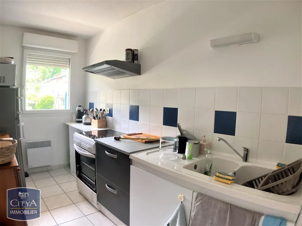 Köök - Three-Bedroom Apartment with Balcony in Cahors