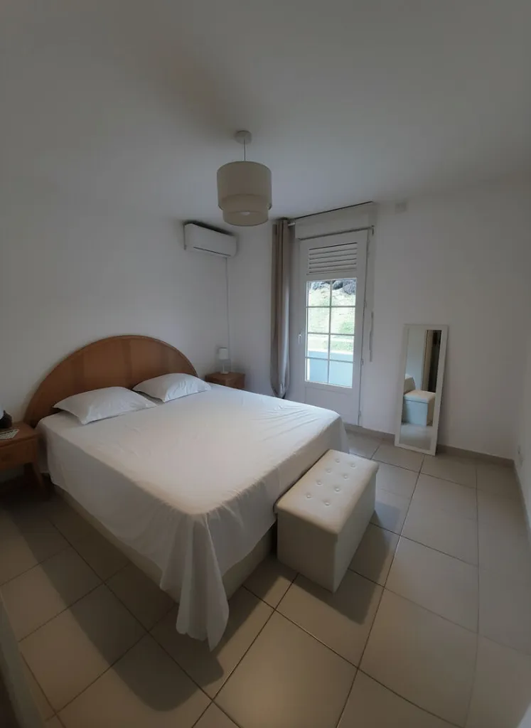 Chambres - Appartement Meublé avec Terrasse à Le Lamentin