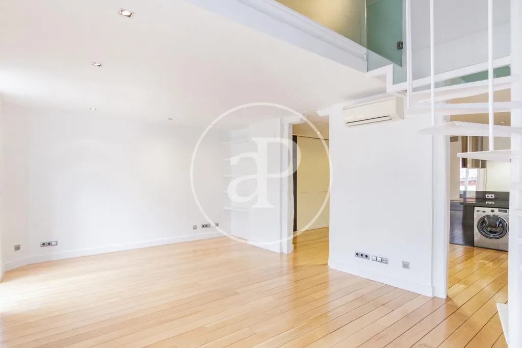 Living Room - Modern Apartment with Balcony Views in Madrid Centre