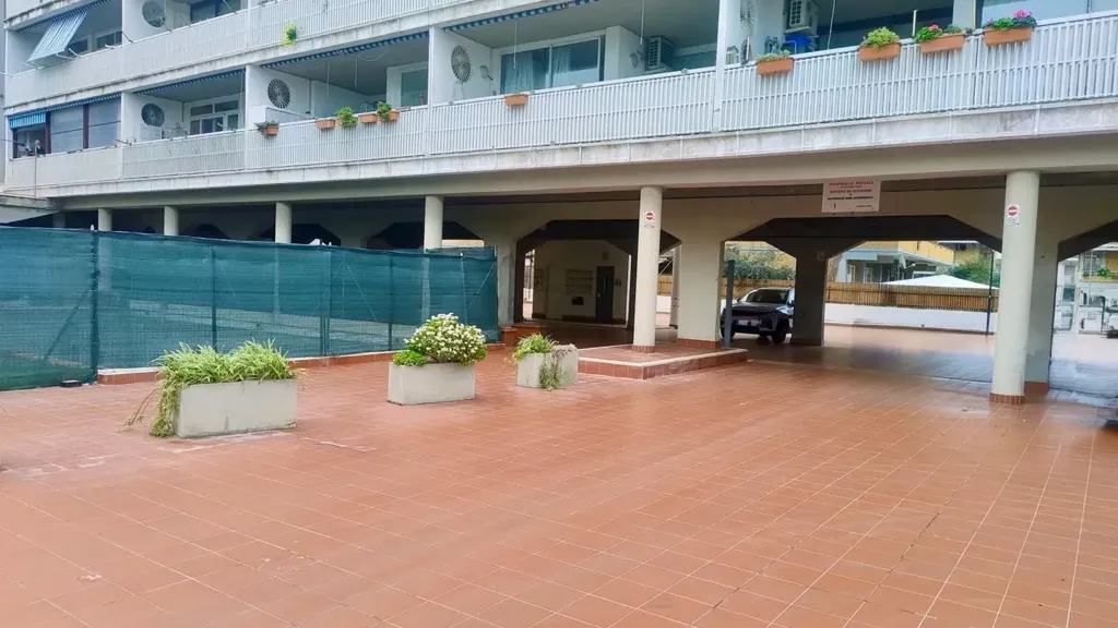 Garage - Modernised 2-Bed Flat with Terrace in Santa Marinella