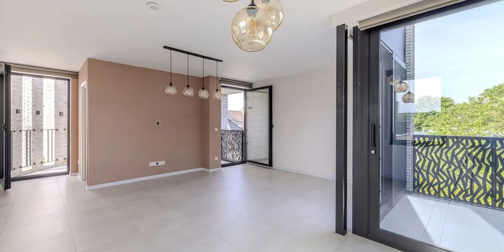 Esik - Energy-Efficient Apartment with Terraces in Kessel
