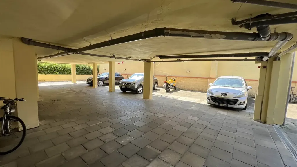 Garage - Two-Level Apartment with Balcony in Campi Bisenzio