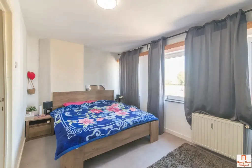 Bedrooms - Apartment Building with High Visibility in Herk-de-Stad