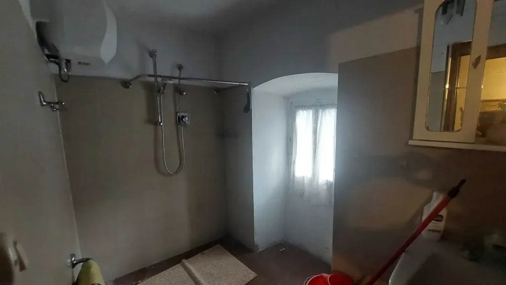 Bathrooms - Terraced House with Garden in Vernio
