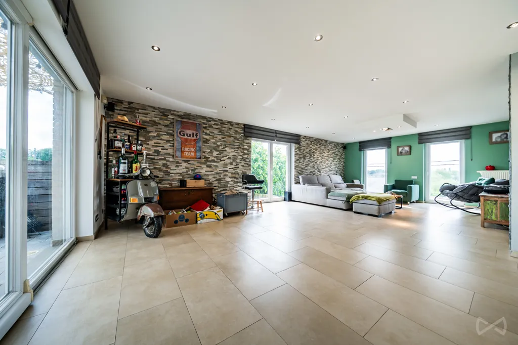 Living Room - House with Photovoltaic Panels in Courcelles