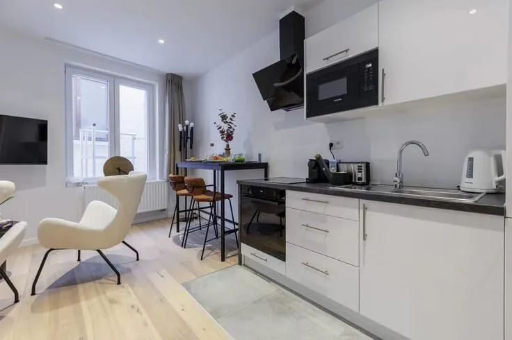 Cuisine - Appartement 1BR avec Rendement Immédiat au Centre de Bruxelles