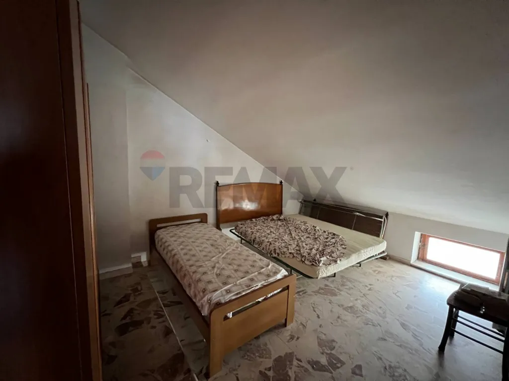 Chambres - Mansard Apartment with Terrace in Stigliano