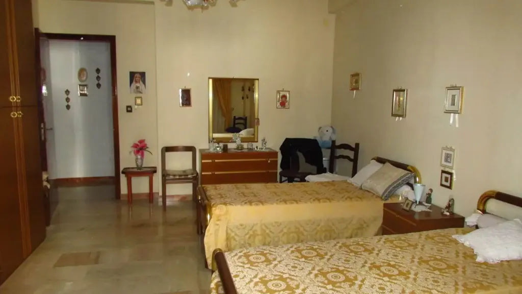 Chambres - Appartement 7 pièces à IT