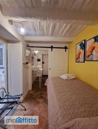 Schlafzimmer - One-Bedroom Apartment in Via Monte di Dio, Naples