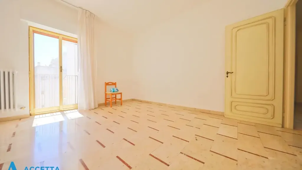 Pièces - Two-Bedroom Apartment with Balcony in Taranto