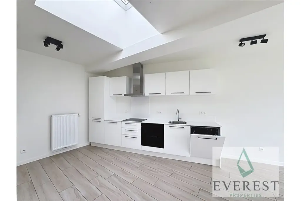 Cuisine - Appartement Duplex avec Jardin et Terrasse à Laeken